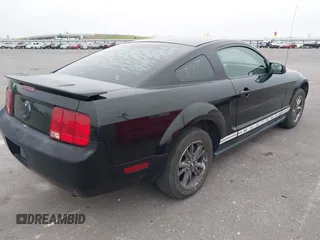 2008 Ford Mustang Deluxe with VIN 1ZVHT80N785208683, listed as a IAAI auction lot 42120817 with 144,300 mi miles. Bid and sale history available at carsss.com. Image 4.