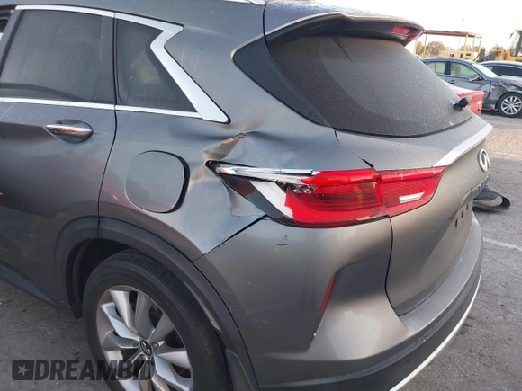 2021 Infiniti QX50 Luxe with VIN 3PCAJ5BA9MF124179, listed as a IAAI auction lot 42296244 with 79,935 mi miles and . Bid and sale history available at DreamBid. Image 6.