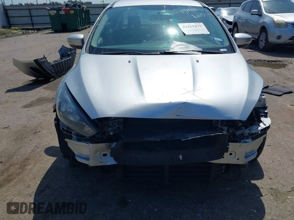 2017 Ford Focus SE with VIN 1FADP3F2XHL256136, listed as a IAAI auction lot 42215479 with 89,945 mi miles and . Bid and sale history available at DreamBid. Image 12.