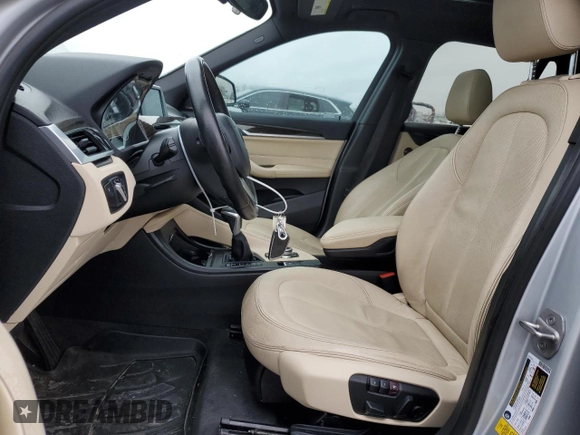 2017 BMW X1 sDrive28i with VIN WBXHU7C33H5H34013, listed as a Copart auction lot 38409444 with 87,558 mi miles and Salvage Title. Bid and sale history available at carsss.com. Image 7.