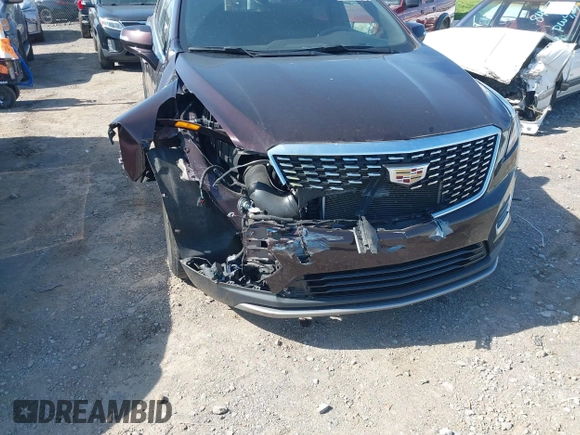 2021 Cadillac XT5 FWD Premium Luxury with VIN 1GYKNCRSXMZ118990, listed as a IAAI auction lot 41991857 with 92,085 mi miles and . Bid and sale history available at DreamBid. Image 6.