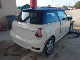 2011 MINI Hardtop with VIN WMWSU3C5XBT095591, listed as a IAAI auction lot 42366393 with 99,092 mi miles and . Bid and sale history available at DreamBid. Image 4.