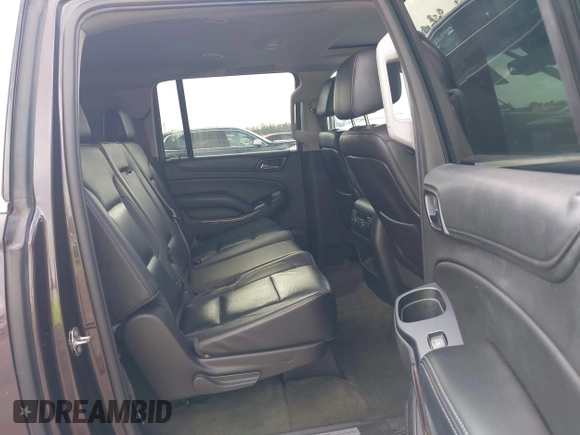 2015 Chevrolet Suburban LT with VIN 1GNSCJKCXFR175154, listed as a IAAI auction lot 42280418 with 227,373 mi miles and . Bid and sale history available at DreamBid. Image 8.
