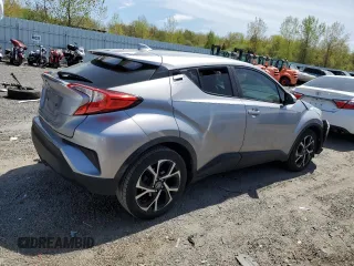 2018 Toyota C-HR XLE z VIN NMTKHMBX8JR001011, wystawiony jako Copart lot #55469265 z przebiegiem 106 938 mil mil oraz Szkoda całkowita • Salvage title. Historia ofert i sprzedaży dostępna na DreamBid. Obrazek 3.