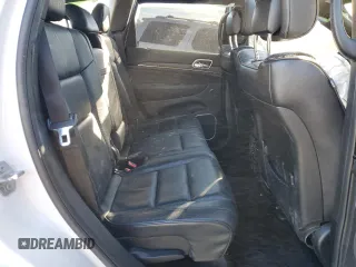 2018 Jeep Grand Cherokee High Altitude with VIN 1C4RJECG1JC125602, listed as a Copart auction lot 88702275 with 59,701 mi miles and Salvage title. Bid and sale history available at DreamBid. Image 12.