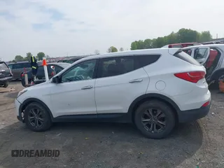 2014 Hyundai Santa Fe z VIN 5XYZTDLB1EG197765, wystawiony jako IAAI lot #41999374 z przebiegiem 172 430 mil mil oraz . Historia ofert i sprzedaży dostępna na DreamBid. Obrazek 14.