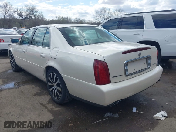 2003 Cadillac DeVille z VIN 1G6KD54Y13U208351, wystawiony jako IAAI lot #41889713 z przebiegiem 132 774 mil mil oraz . Historia ofert i sprzedaży dostępna na DreamBid. Obrazek 3.