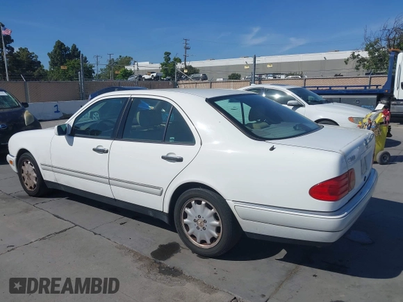 1996 Mercedes-Benz E 320 with VIN WDBJF55F1TJ014659, listed as a IAAI auction lot 42273213 with 151,584 mi miles and . Bid and sale history available at DreamBid. Image 3.