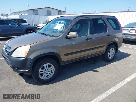 2002 Honda CR-V EX with VIN JHLRD78842C054131, listed as a IAAI auction lot 42101159 with 266,533 mi miles and . Bid and sale history available at DreamBid. Image 18.