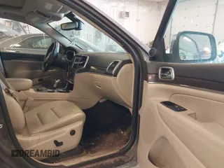 2018 Jeep Grand Cherokee Limited with VIN 1C4RJFBG9JC268479, listed as a IAAI auction lot 42032948 with 106,077 mi miles and . Bid and sale history available at DreamBid. Image 5.