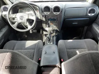 2006 GMC Envoy SLE with VIN 1GKET16S766125647, listed as a Copart auction lot 74894724 with 162,905 mi miles and Salvage Title. Bid and sale history available at DreamBid. Image 8.