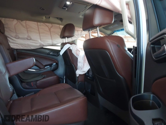 2016 Chevrolet Tahoe LTZ z VIN 1GNSKCKC4GR359442, wystawiony jako IAAI lot #41871814 z przebiegiem 158 533 mil mil oraz . Historia ofert i sprzedaży dostępna na DreamBid. Obrazek 8.