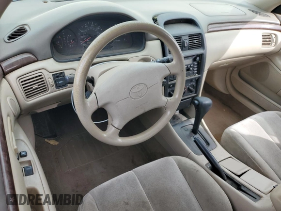 2001 Toyota Solara SE z VIN 2T1CG22P91C499399, wystawiony jako Copart lot #47364615 z przebiegiem 250 263 mil mil oraz Szkoda całkowita • Salvage title. Historia ofert i sprzedaży dostępna na DreamBid. Obrazek 8.