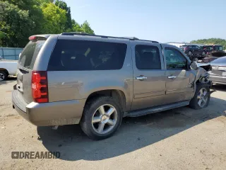 2013 Chevrolet Suburban LT with VIN 1GNSCJE07DR104489, listed as a Copart auction lot 60844784 with 185,420 mi miles and Salvage Title. Bid and sale history available at carsss.com. Image 3.