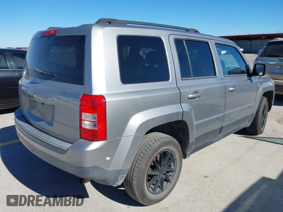 2015 Jeep Patriot Sport with VIN 1C4NJPBA8FD325398, listed as a IAAI auction lot 40696837 with 136,130 mi miles. Bid and sale history available at carsss.com. Image 4.