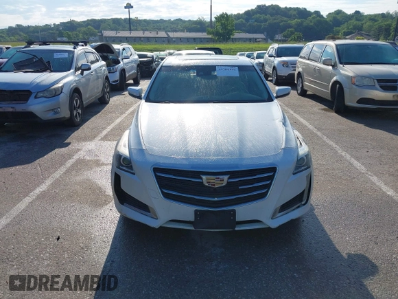 2015 Cadillac CTS Luxury AWD z VIN 1G6AX5SX9F0107244, wystawiony jako IAAI lot #42386444 z przebiegiem 171 413 mil mil oraz . Historia ofert i sprzedaży dostępna na DreamBid. Obrazek 12.