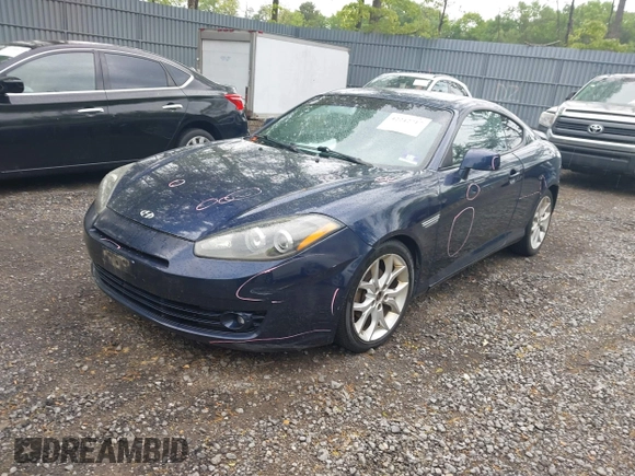 2008 Hyundai Tiburon GT z VIN KMHHN66F98U281833, wystawiony jako IAAI lot #42242717 z przebiegiem 123 291 mil mil oraz . Historia ofert i sprzedaży dostępna na DreamBid. Obrazek 2.