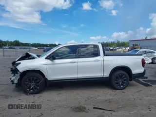 2024 Honda Ridgeline Sport with VIN 5FPYK3F14RB011166, listed as a IAAI auction lot 42591313 with 5,175 mi miles and . Bid and sale history available at DreamBid. Image 14.