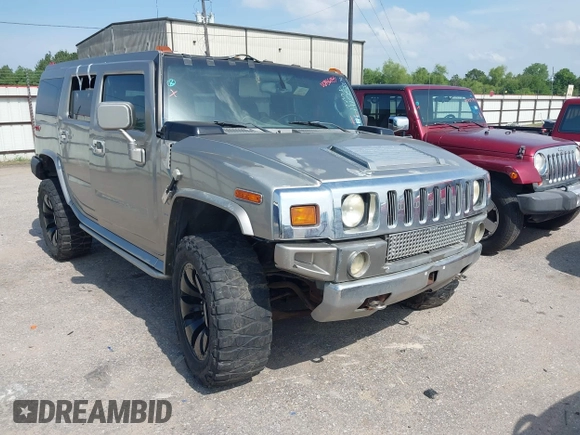 2004 Hummer H2 z VIN 5GRGN23U34H105809, wystawiony jako IAAI lot #42456055 z przebiegiem Nie podano mil oraz . Historia ofert i sprzedaży dostępna na DreamBid. Obrazek 1.
