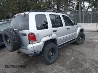 2002 Jeep Liberty Limited with VIN 1J4GL58K62W226966, listed as a IAAI auction lot 41700979 with 215,966 mi miles and . Bid and sale history available at carsss.com. Image 4.
