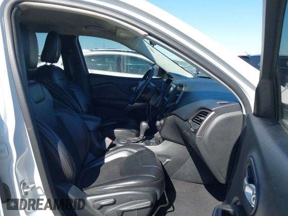 2019 Jeep Cherokee Latitude Plus with VIN 1C4PJLLNXKD290098, listed as a IAAI auction lot 40840063 with 202,244 mi miles and . Bid and sale history available at DreamBid. Image 5.
