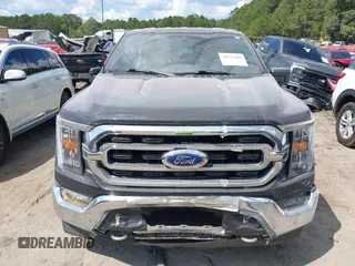 2021 Ford F-150 XL with VIN 1FTFW1E5XMKE21429, listed as a IAAI auction lot 40347406 with 125,000 mi miles. Bid and sale history available at carsss.com. Image 12.
