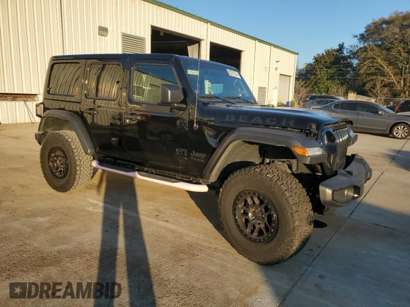 2022 Jeep Wrangler Unlimited High Tide with VIN 1C4HJXDG0NW247152, listed as a Copart auction lot 82371674 with 32,417 mi miles and Salvage Title. Bid and sale history available at DreamBid. Image 4.