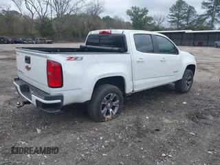 2020 Chevrolet Colorado 4WD Z71 with VIN 1GCGTDEN6L1228309, listed as a IAAI auction lot 41865357 with 100,560 mi miles and . Bid and sale history available at DreamBid. Image 4.