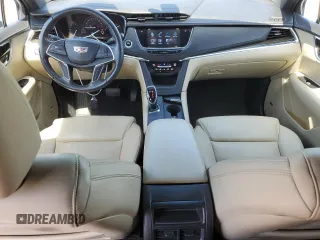 2017 Cadillac XT5 FWD with VIN 1GYKNARS2HZ131243, listed as a Copart auction lot 54189395 with 134,324 mi miles and Salvage Title. Bid and sale history available at DreamBid. Image 8.