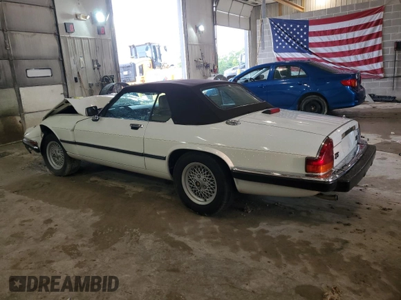 1989 Jaguar XJS z VIN SAJNV4847KC151989, wystawiony jako Copart lot #61401054 z przebiegiem 80 570 mil mil oraz Szkody całkowita. Historia ofert i sprzedaży dostępna na DreamBid. Obrazek 2.