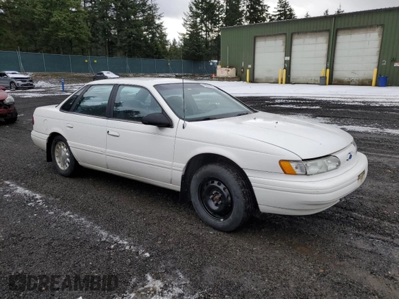 1994 Ford Taurus z VIN 1FALP5344RA291510, wystawiony jako Copart lot #43854925 z przebiegiem 69 067 mil mil oraz Tytuł czysty. Historia ofert i sprzedaży dostępna na DreamBid. Obrazek 4.