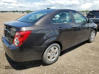 2014 Chevrolet Sonic LS with VIN 1G1JA5SH1E4241785, listed as a Copart auction lot 61914455 with 95,014 mi miles and Clean title. Bid and sale history available at DreamBid. Image 3.