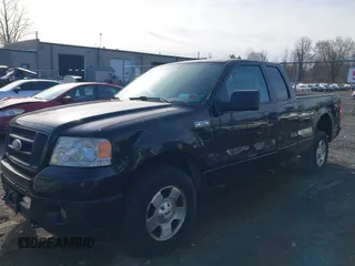 2007 Ford F-150 STX with VIN 1FTRX14W07FA39394, listed as a IAAI auction lot 41959272 with 190,477 mi miles. Bid and sale history available at carsss.com. Image 2.