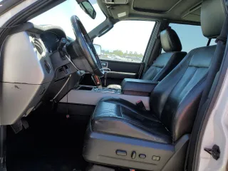 2010 Ford Expedition Max Limited with VIN 1FMJK2A51AEB72557, listed as a Copart auction lot 57664744 with 210,643 mi miles and Salvage title. Bid and sale history available at DreamBid. Image 7.