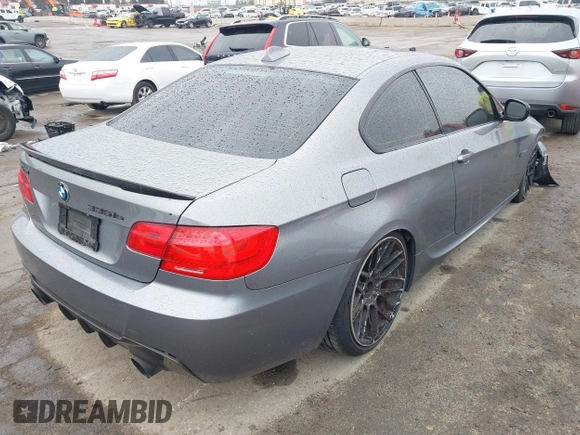 2011 BMW 3 Series 335is with VIN WBAKG1C52BE599455, listed as a IAAI auction lot 41724159 with 121,570 mi miles and . Bid and sale history available at carsss.com. Image 4.