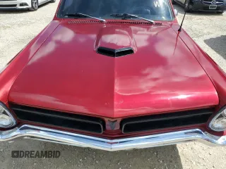 1965 Pontiac GTO z VIN 233275P156710, wystawiony jako Copart lot #74094594 z przebiegiem 22 008 mil mil oraz Szkoda całkowita • Salvage title. Historia ofert i sprzedaży dostępna na DreamBid. Obrazek 11.