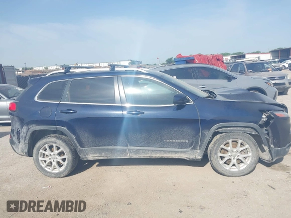2015 Jeep Cherokee Latitude with VIN 1C4PJLCB9FW683459, listed as a IAAI auction lot 41998309 with 176,769 mi miles and . Bid and sale history available at carsss.com. Image 13.