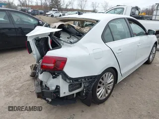 2016 Volkswagen Jetta Sedan 1.8T SEL with VIN 3VWL07AJXGM214382, listed as a IAAI auction lot 42042424 with 1 mi miles. Bid and sale history available at carsss.com. Image 4.
