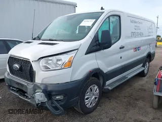 2021 Ford Transit Cargo with VIN 1FTBR1Y81MKA25014, listed as a IAAI auction lot 41594717 with 49,983 mi miles and . Bid and sale history available at DreamBid. Image 17.