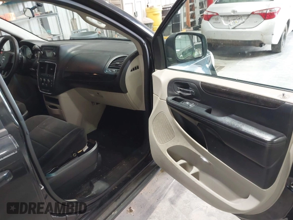 2013 Dodge Grand Caravan SXT with VIN 2C4RDGCG2DR527482, listed as a IAAI auction lot 42199622 with 198,248 mi miles and . Bid and sale history available at DreamBid. Image 5.