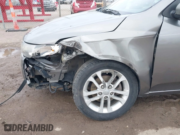 2012 Kia Forte EX with VIN KNAFU4A24C5632655, listed as a IAAI auction lot 41932379 with 146,273 mi miles. Bid and sale history available at carsss.com. Image 6.