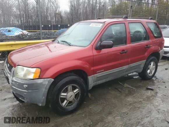 2001 Ford Escape XLS with VIN 1FMYU02181KA64401, listed as a Copart auction lot 44216825 with 196,408 mi miles and Salvage Title. Bid and sale history available at carsss.com. Image 1.