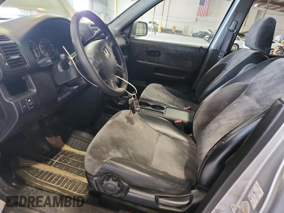 2002 Honda CR-V EX with VIN JHLRD78852C054719, listed as a Copart auction lot 64464625 with 313,662 mi miles and Clean title. Bid and sale history available at DreamBid. Image 7.