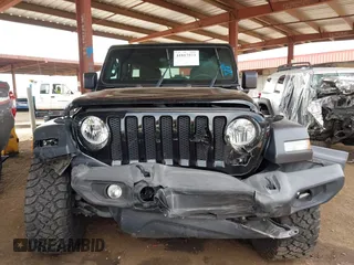 2019 Jeep Wrangler Unlimited Sport S with VIN 1C4HJXDN2KW630780, listed as a IAAI auction lot 41817573 with 56,113 mi miles. Bid and sale history available at carsss.com. Image 6.