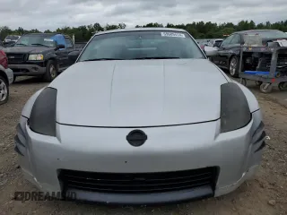 2004 Nissan 350Z Touring z VIN JN1AZ34E24T060564, wystawiony jako Copart lot #69689414 z przebiegiem Nie podano mil oraz Nie do naprawy • Non repairable. Historia ofert i sprzedaży dostępna na DreamBid. Obrazek 5.