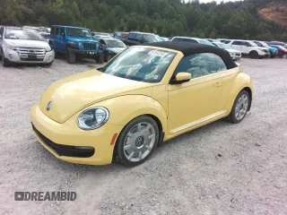 2014 Volkswagen Beetle 2.5L w/Sound/Nav с VIN 3VW5P7AT1EM804571, выставлен на аукционе Copart как лот 61456245 с пробегом Не указан миль и Списание • Salvage title. История ставок и продаж доступна на DreamBid. Изображение 1.