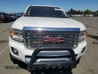 2017 GMC Canyon 4WD Denali z VIN 1GTG6EEN5H1308429, wystawiony jako Copart lot #56491935 z przebiegiem 92 122 mil mil oraz Szkoda całkowita • Salvage title. Historia ofert i sprzedaży dostępna na DreamBid. Obrazek 5.