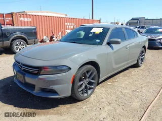2017 Dodge Charger SE with VIN 2C3CDXBG6HH503726, listed as a IAAI auction lot 41663604 with 118,019 mi miles. Bid and sale history available at carsss.com. Image 2.