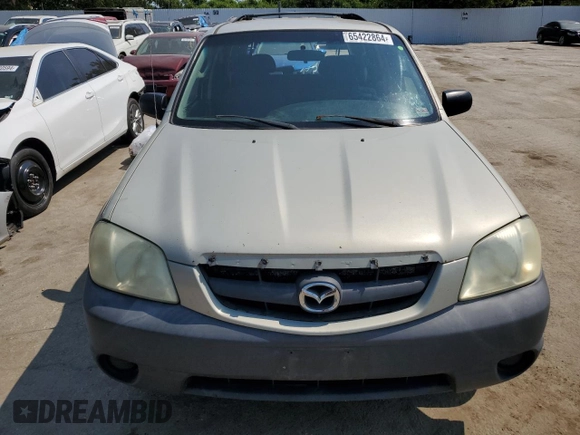 2004 Mazda Tribute DX with VIN 4F2YZ02B74KM13874, listed as a Copart auction lot 65422864 with 288,215 mi miles and Salvage Title. Bid and sale history available at carsss.com. Image 5.