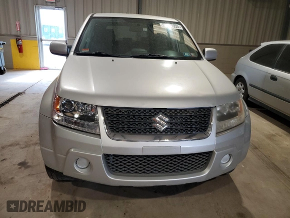 2010 Suzuki Grand Vitara Premium with VIN JS3TD0D29A4101580, listed as a Copart auction lot 56765935 with 120,791 mi miles and Clean title. Bid and sale history available at DreamBid. Image 5.